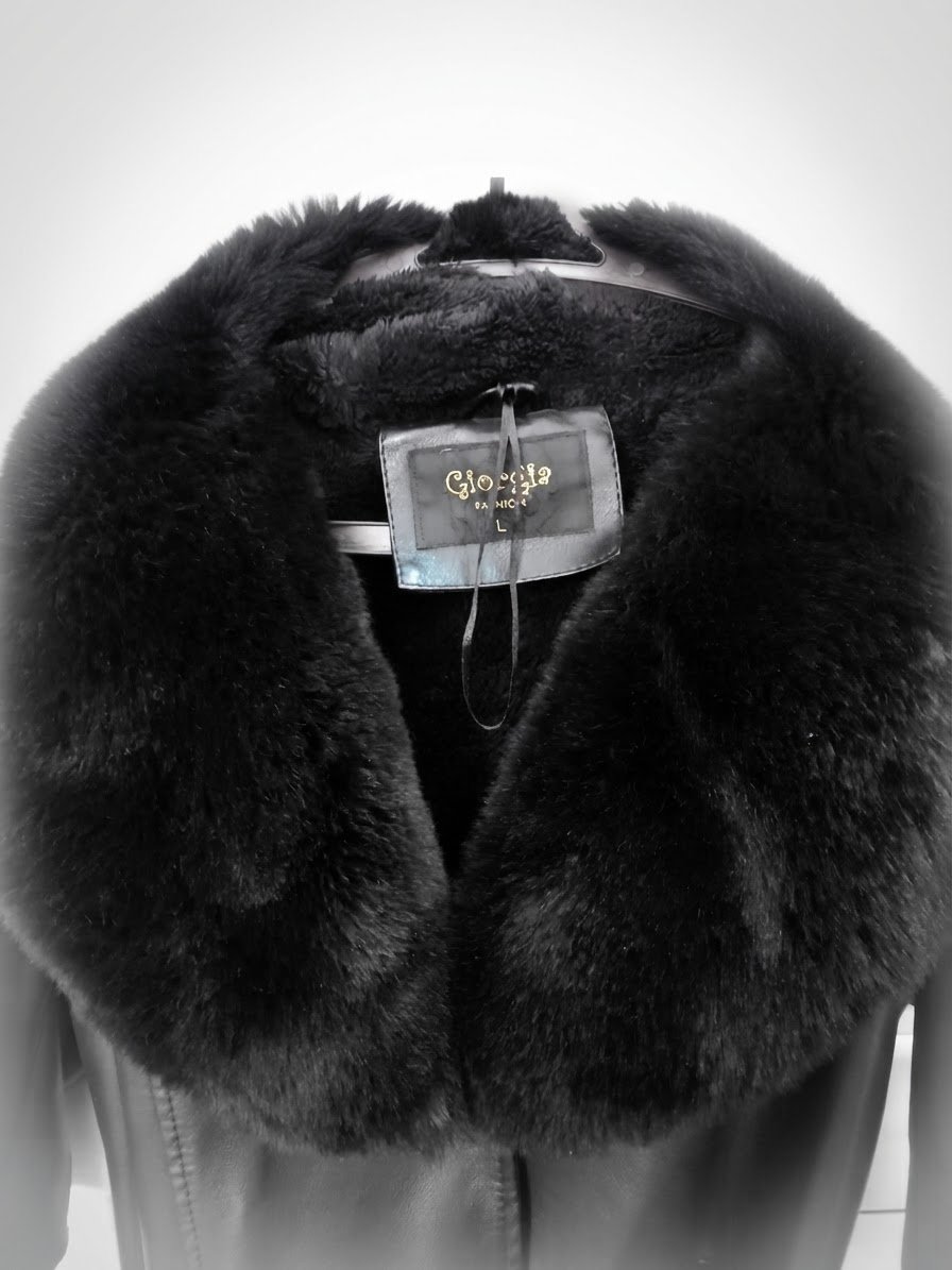 Manteau cuir avec fourire