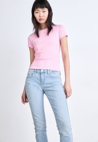Pantalon jean tommy taille 42