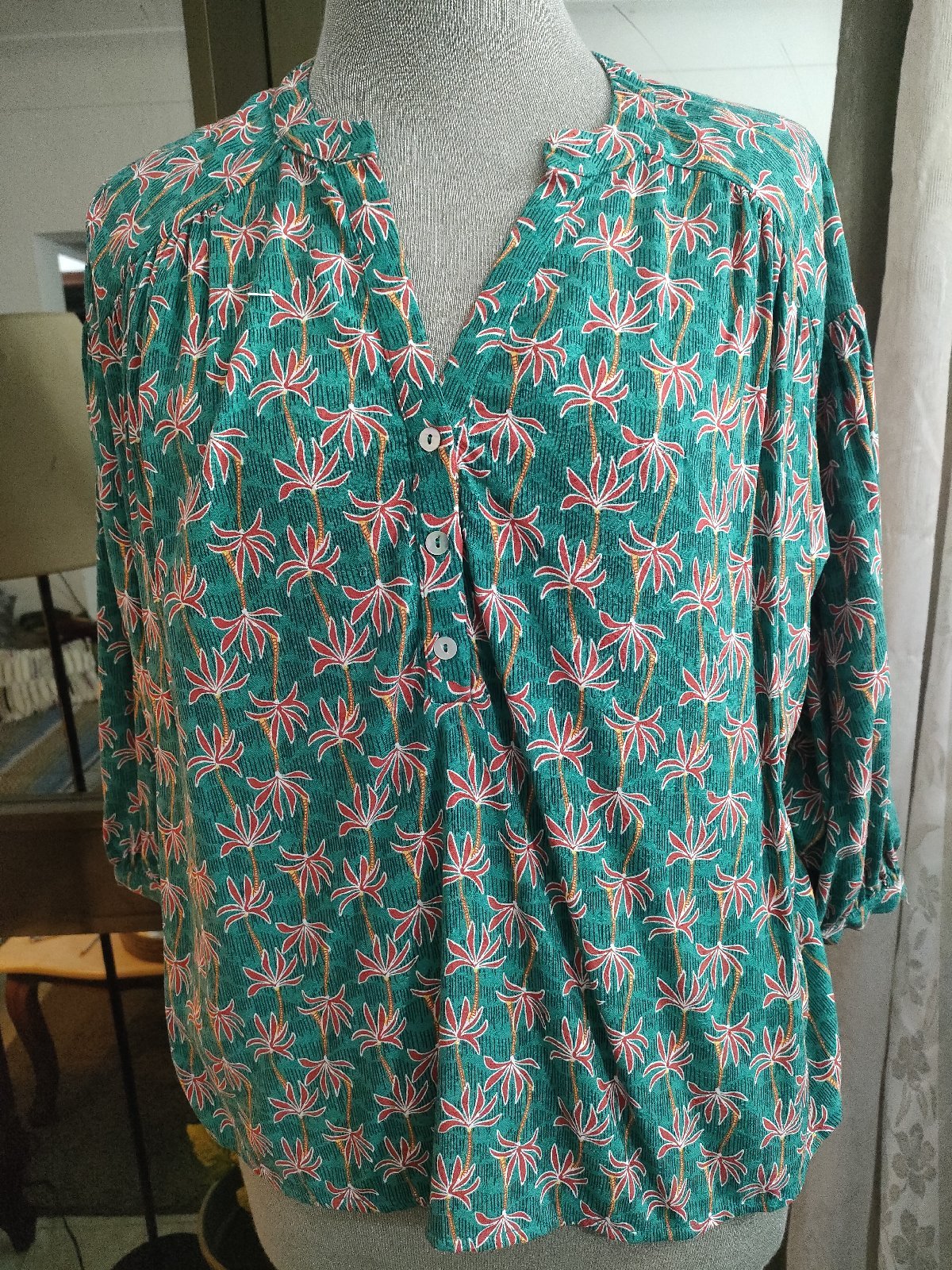 Une chemise taille 38 