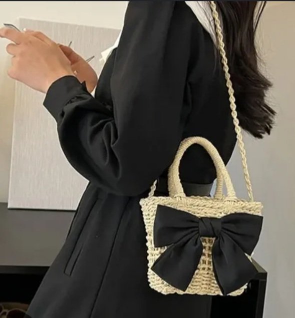 The highlighted item is a mini handwoven straw bucket bag with a prominent black bow accent, designed for summer, beach, and casual daily use