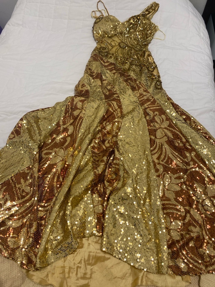 Robe de soiré  neuf en paillete marque Roma