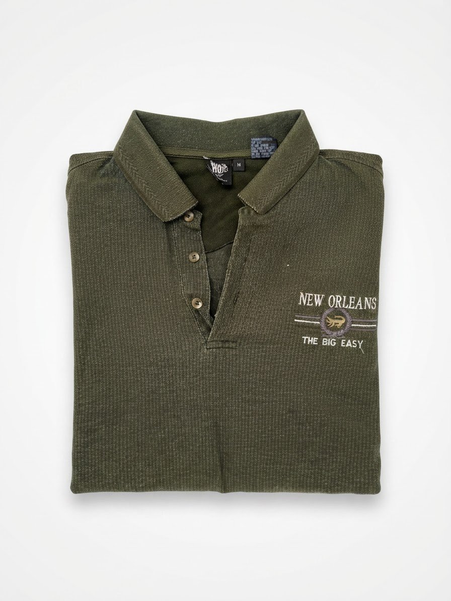 Polo ver foncé en très bonne état forsa 