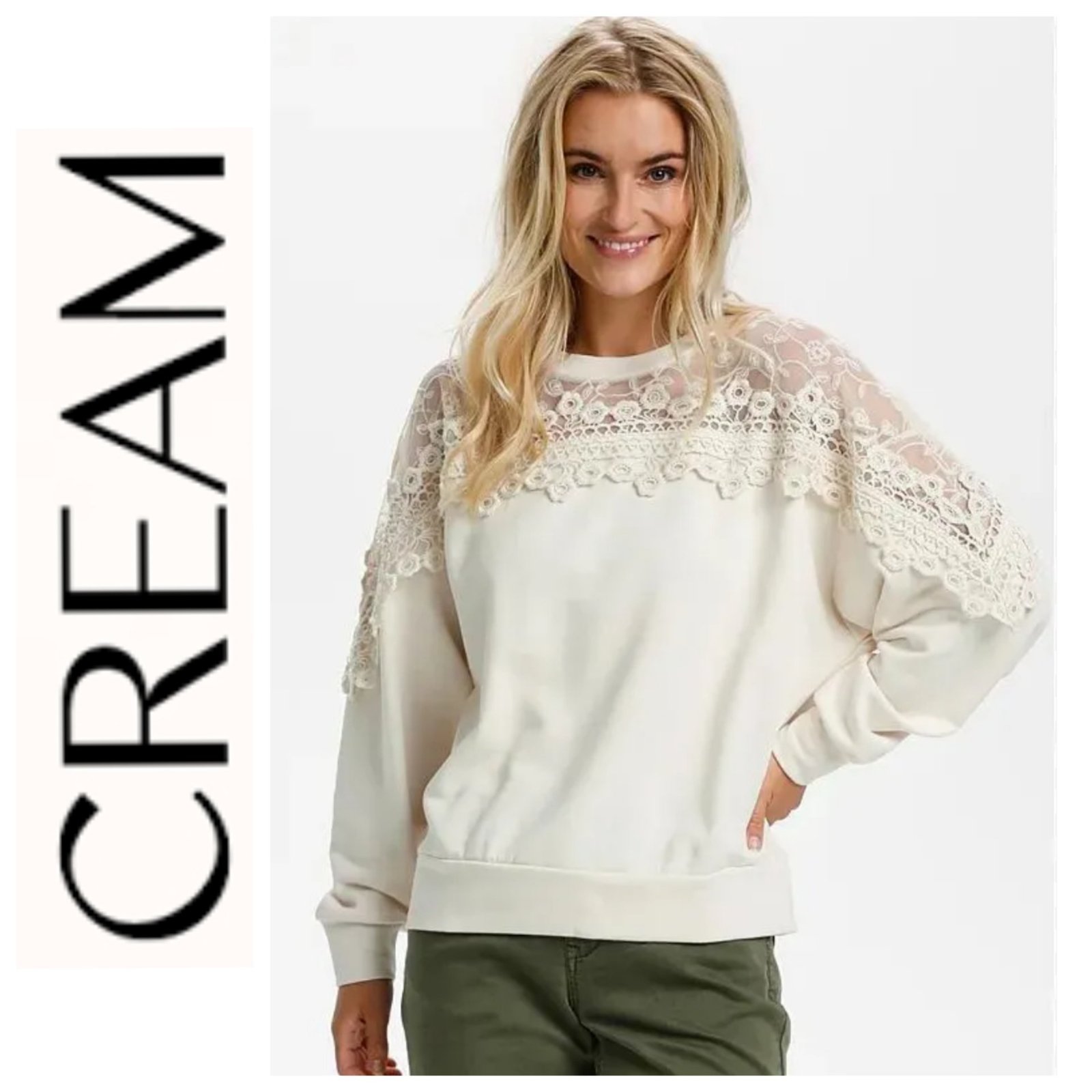 Un sweater en guipure de la marque CREAM