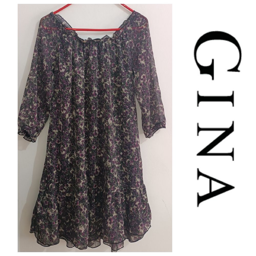 Une jolie robe de la marque GINA