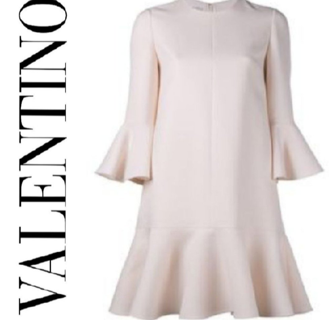 Une magnifique robe AUTHENTIQUE AVEC SON NUMÉRO DE SÉRIE de la marque VALENTINO 