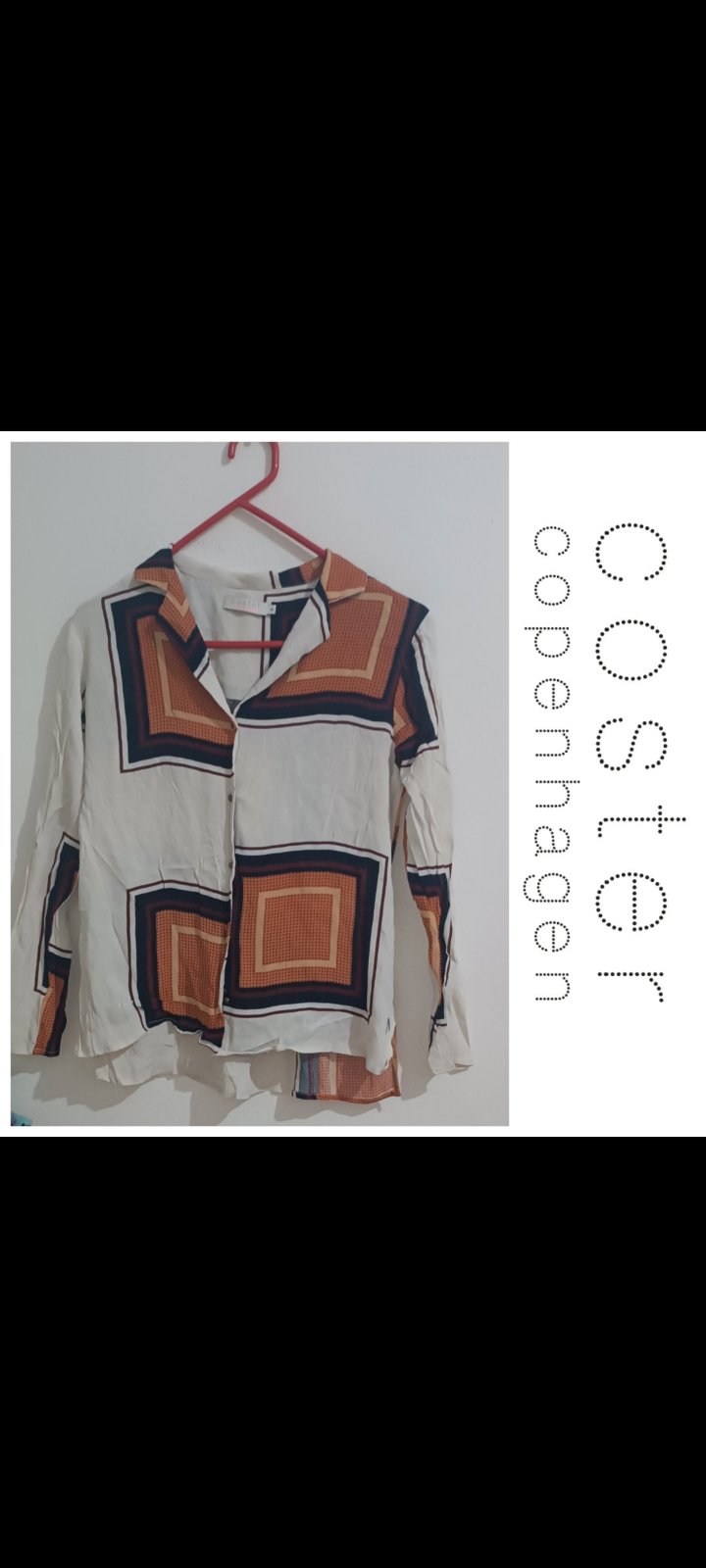Une chemise de la marque COSTER 