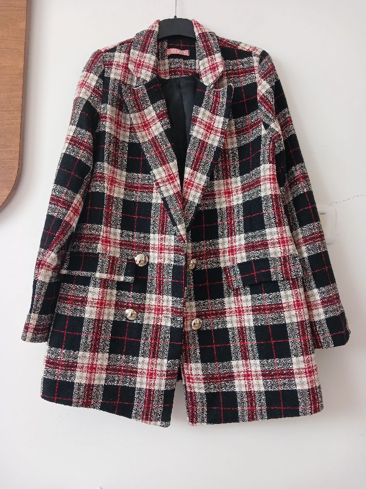 Blazer à  carreaux excellent état 