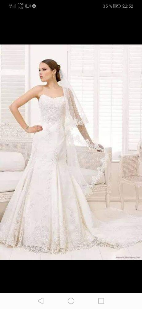 Robe de mariée avec son voile et jupon