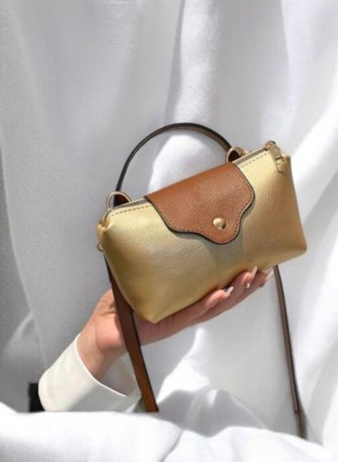 Superbe sac ...mon portable et mon portefeuille rentrent sans problème dedans 