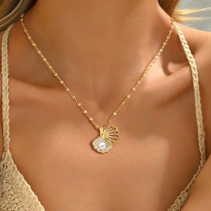 Collier coquillage doré
