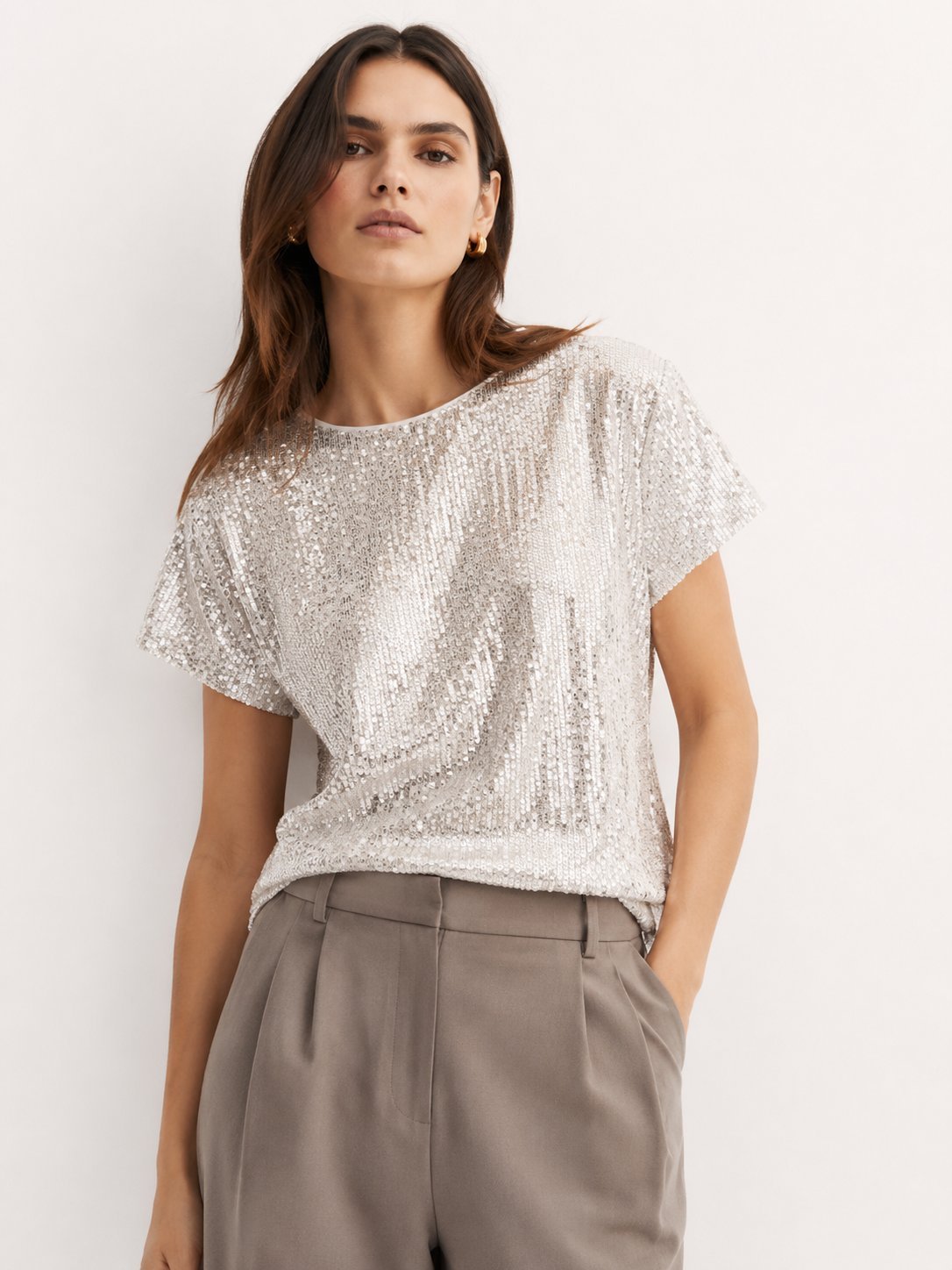 Pull H&M à sequins – Élégance & Brillance 