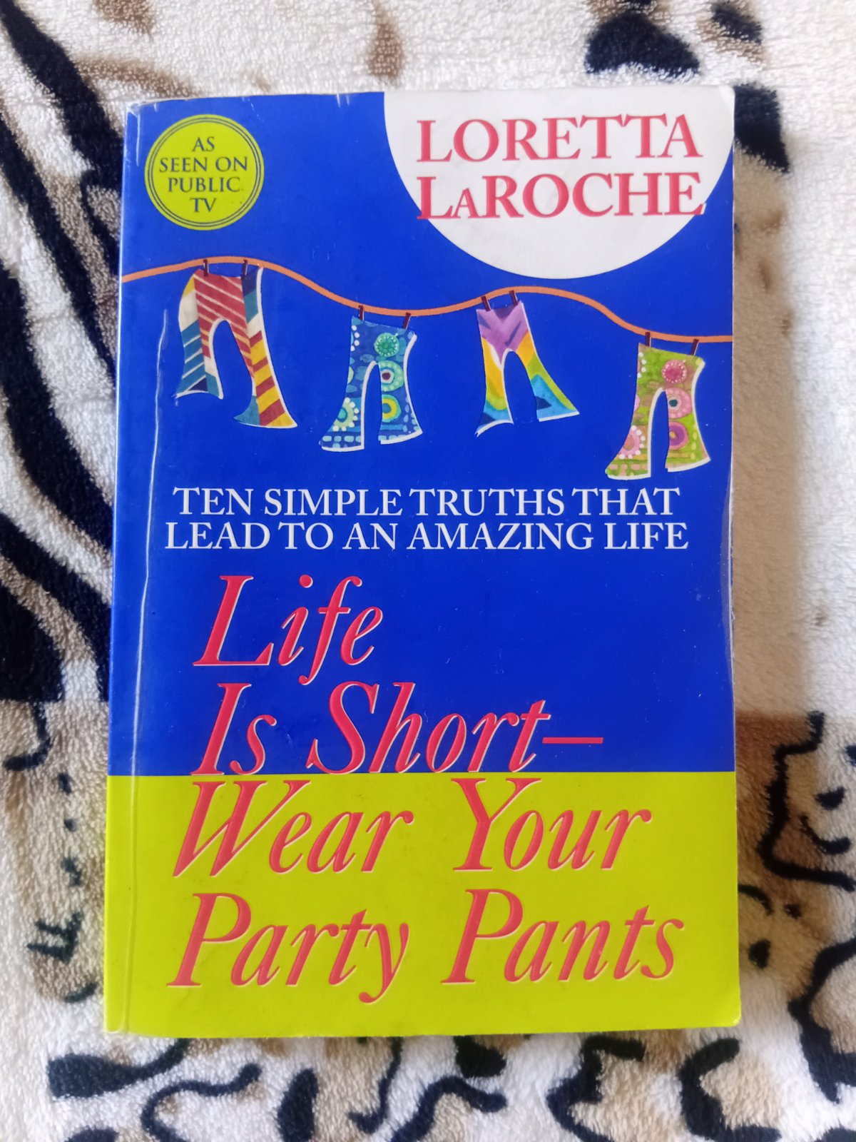 Life is short wear your party pants by Loretta LaRoche.