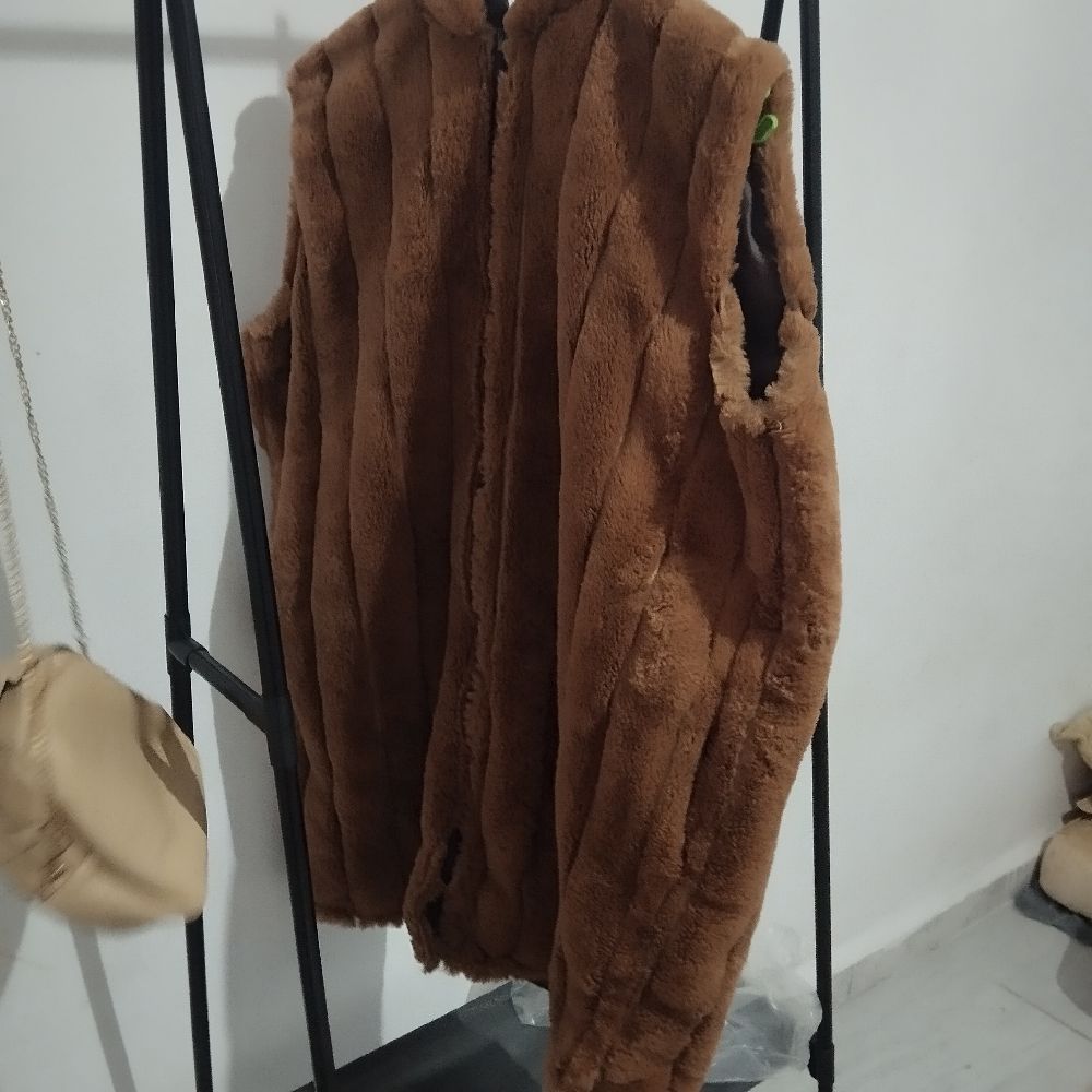 Manteau sans manche 