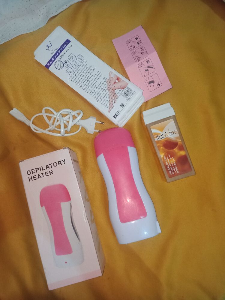 Appareil de cire (jdida masta3maletha 7ata mara)+ les bandes + un cartouche de cire 