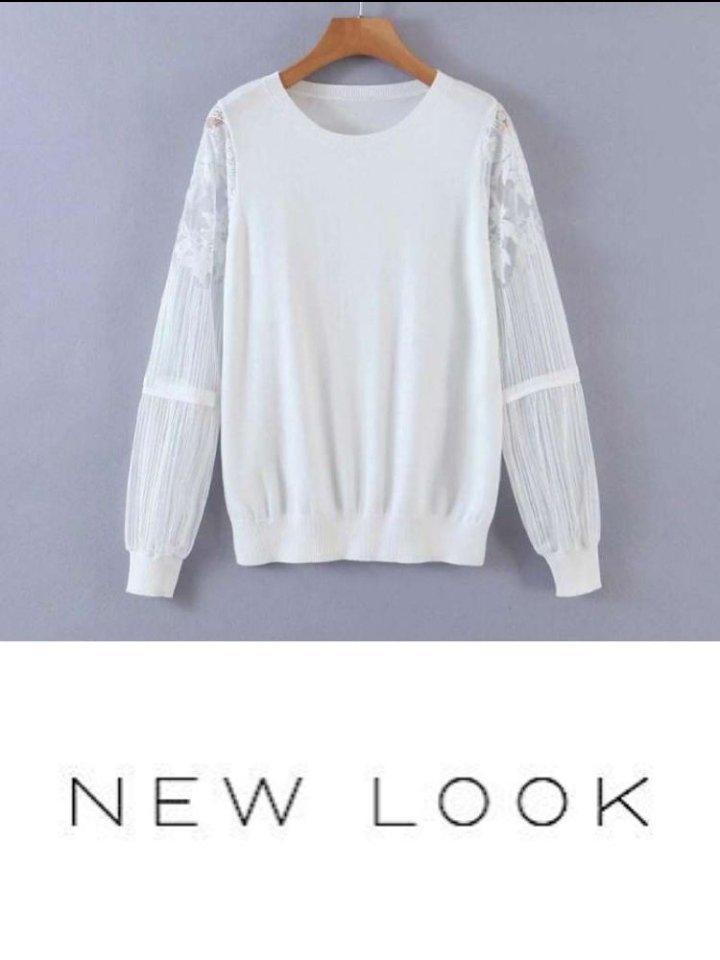 Un pull blanc à manches longues de la marque New Look, avec des empiècements en dentelle et des manches plissées
