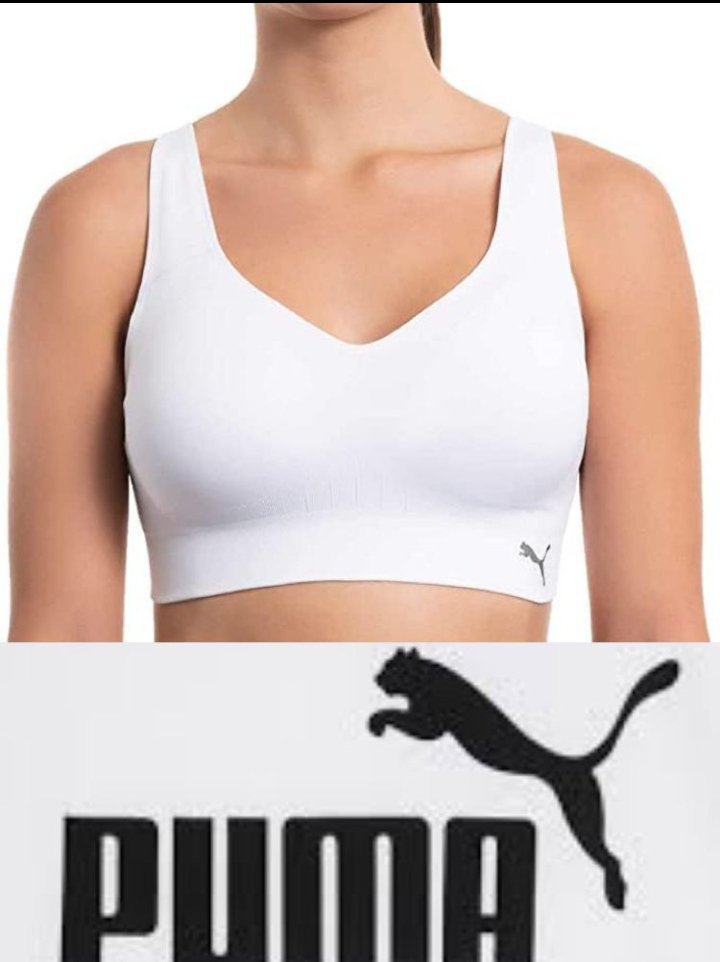 Une brassière de sport gris clair marque PUMA 