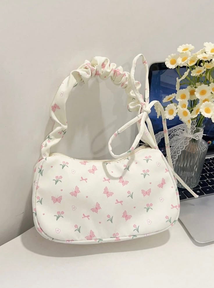Sac blanc avec des papillons 