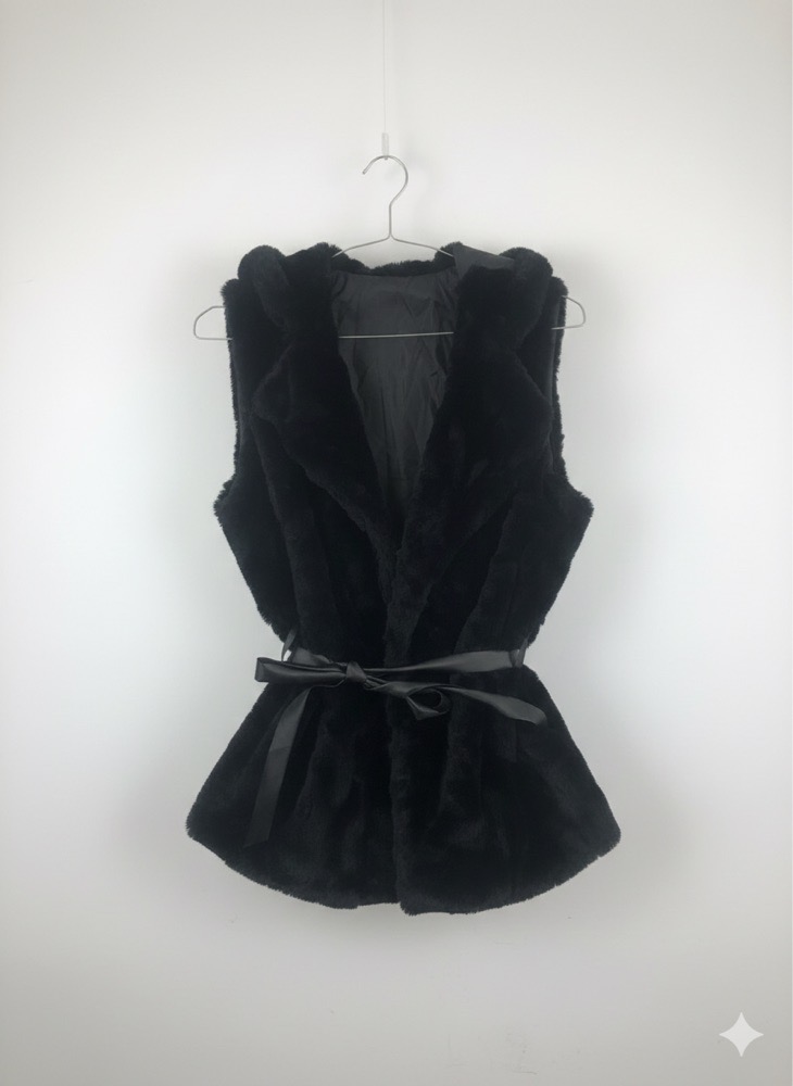 Veste en fourrure noir elgante