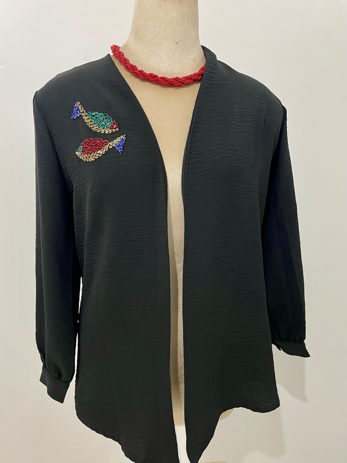Gilet noir avec motif jamais porté taille S/M