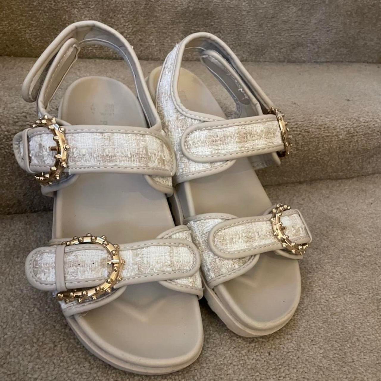 Sandales tendacne pirmark 