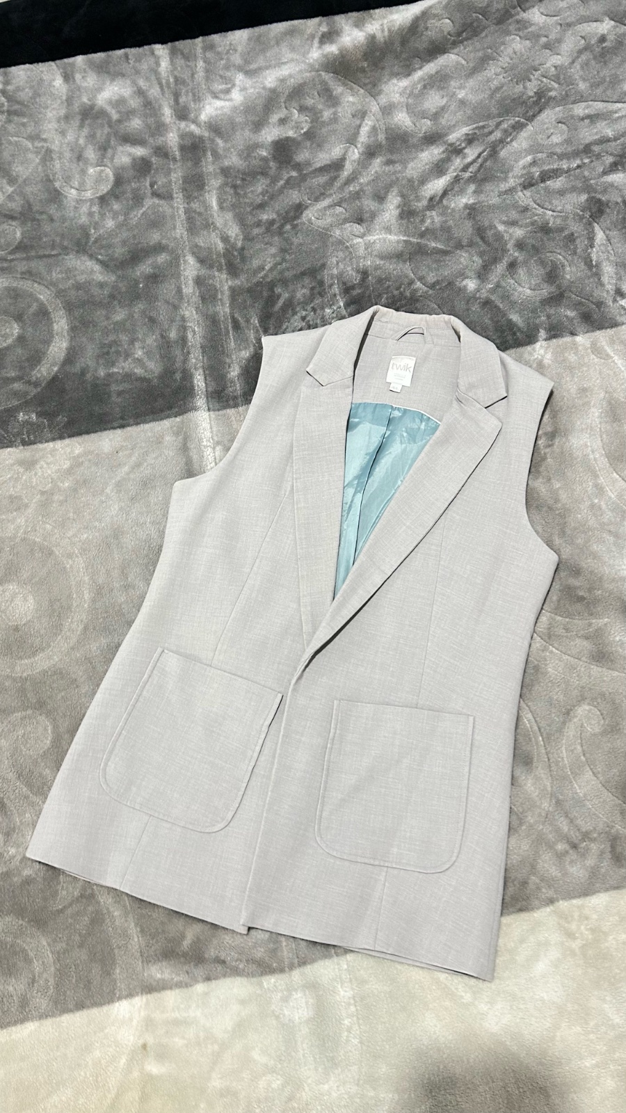 Vest gris