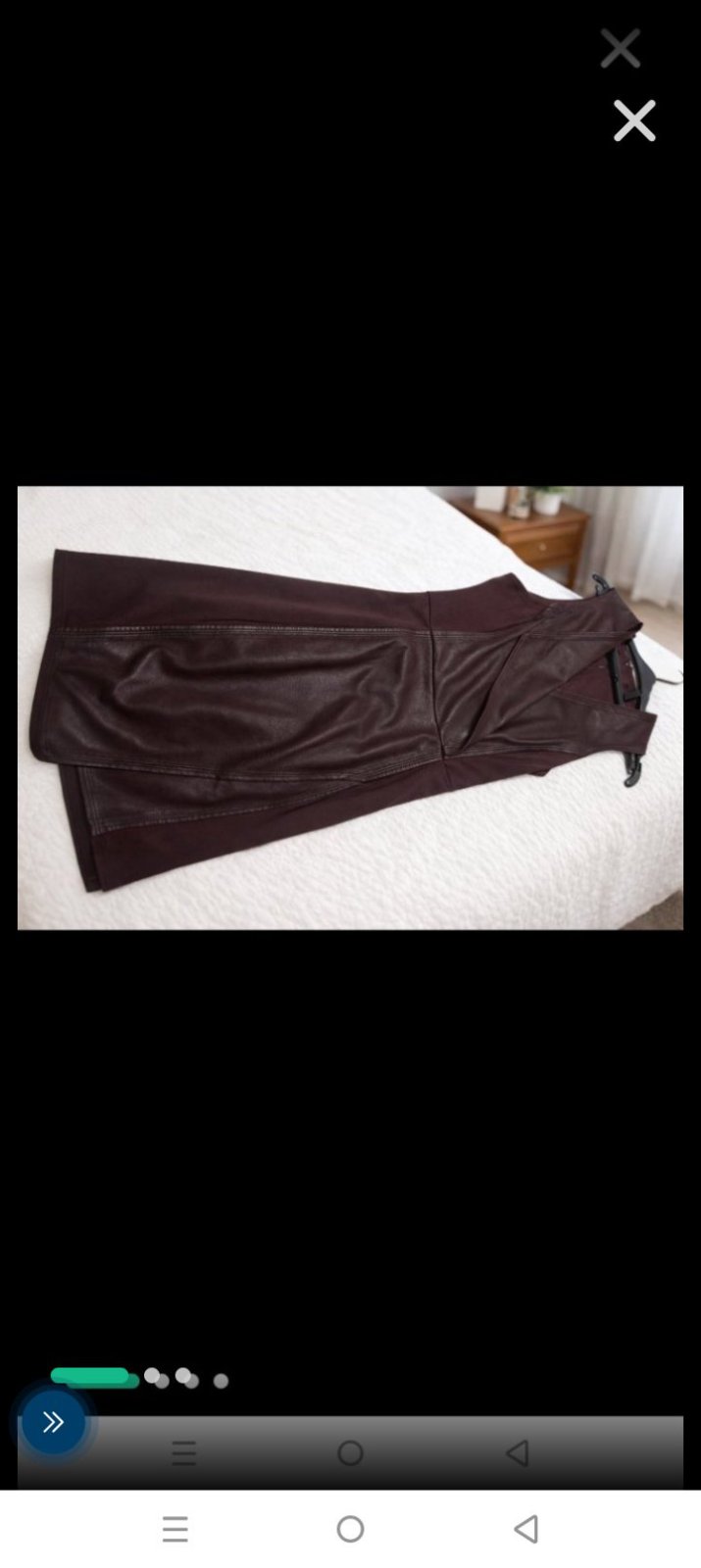 Nouveau prix! Robe ajustée sans manches au style chic et moderne.