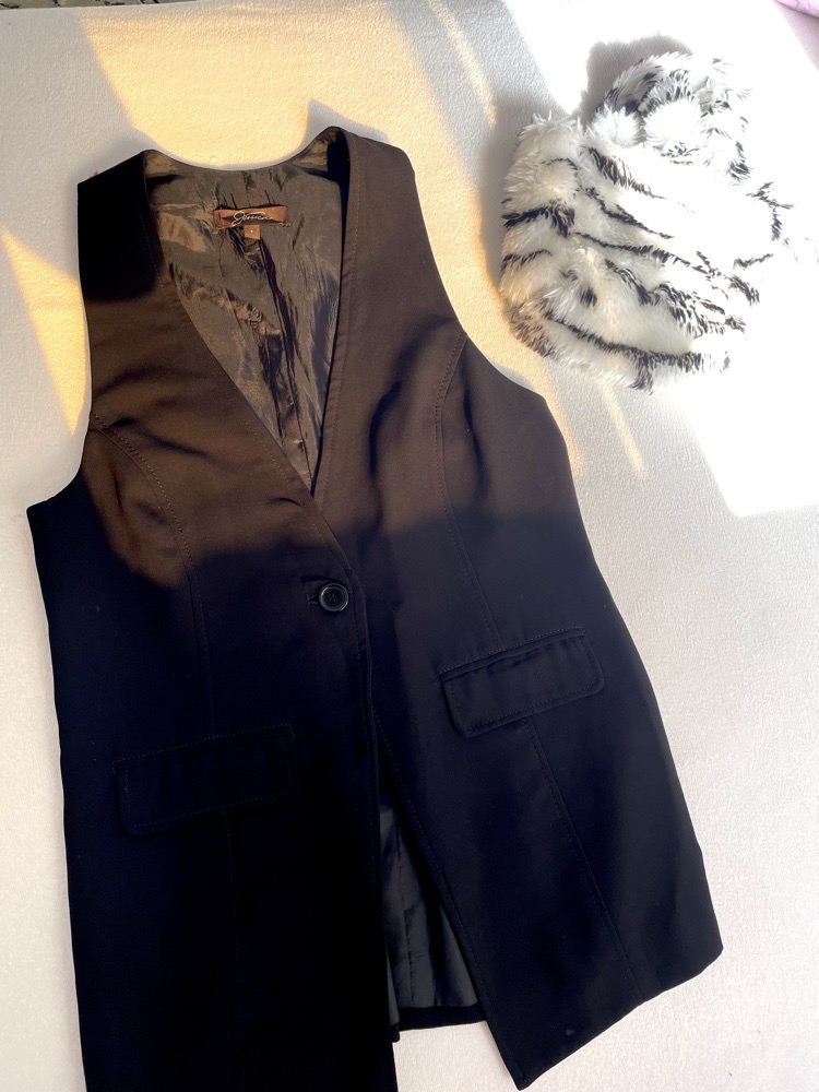 blazer /veste class sans manches en etat neuf