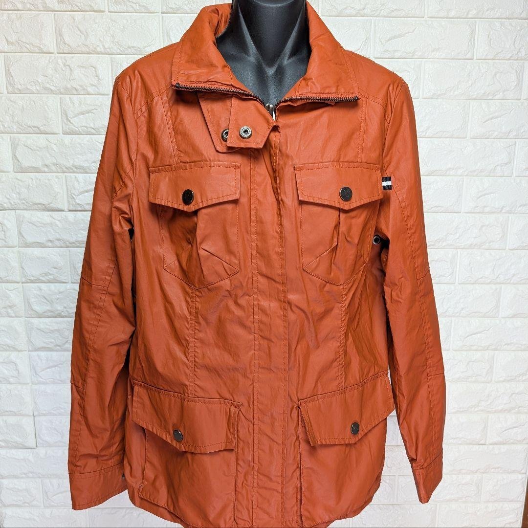 Veste coupe-vent Zara woman Orange en polyester imperméable, style militaire, taille M, en excellent état.
