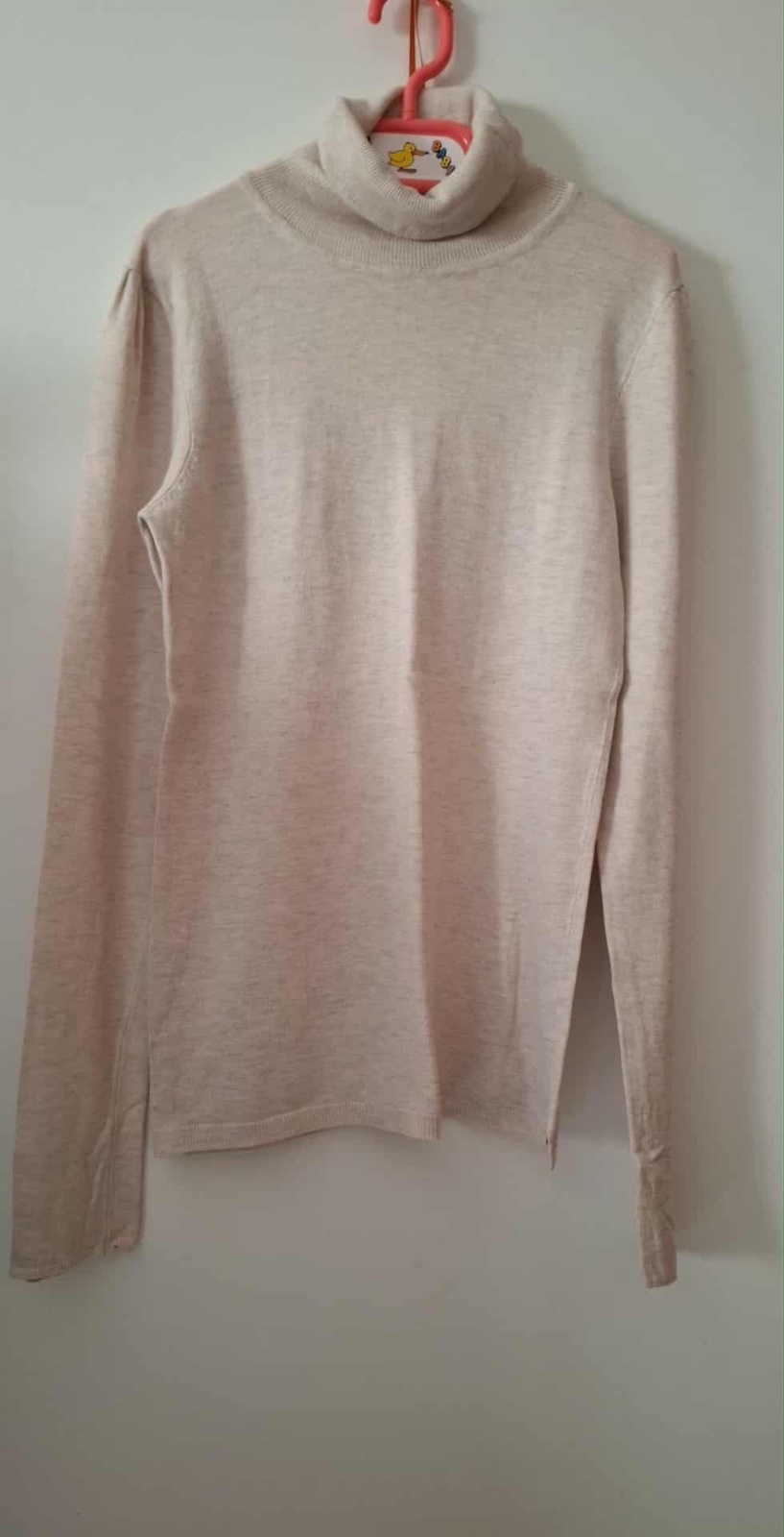 Pull col montant
