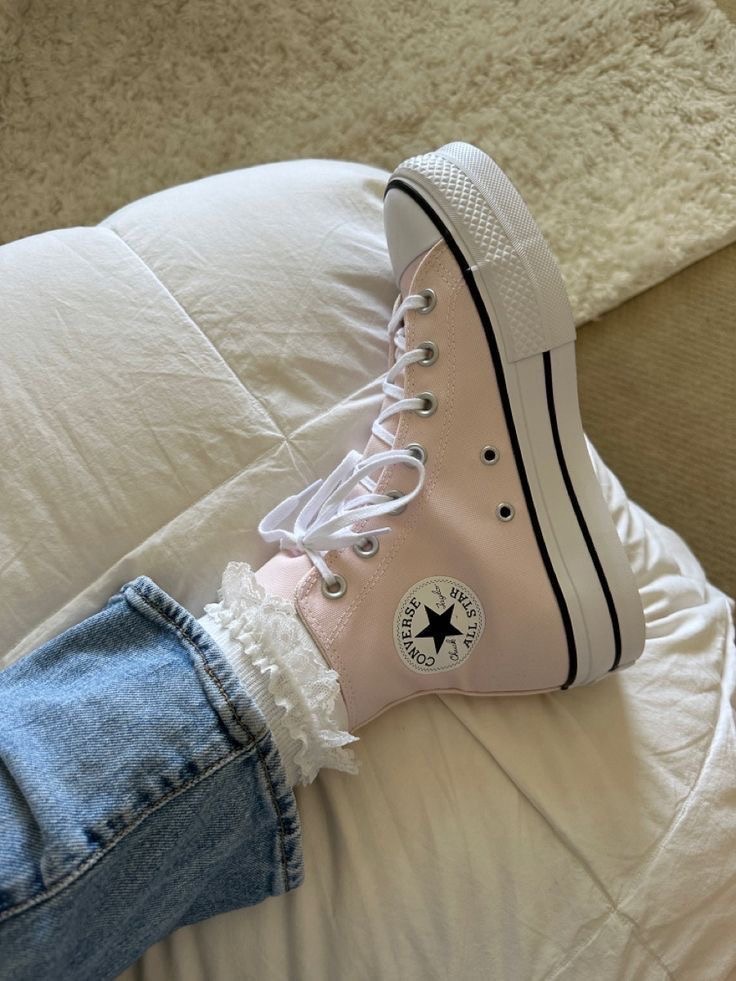 Light pink high top platform converse