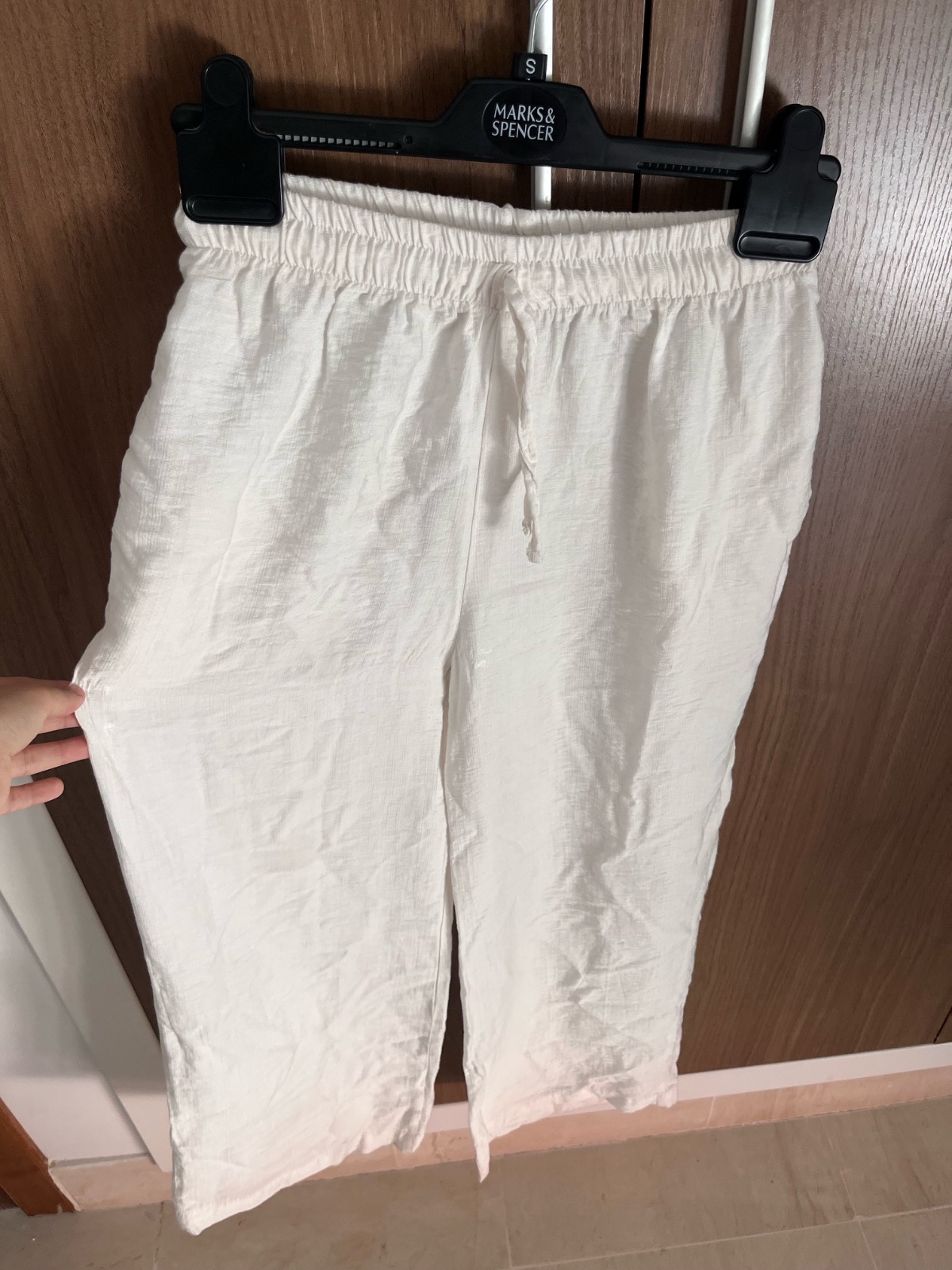 Pontalon en lin blanc taille s de la marque shana trés peu porté 
