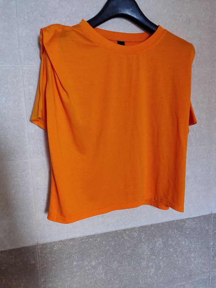 Pull avec des épaulettes 