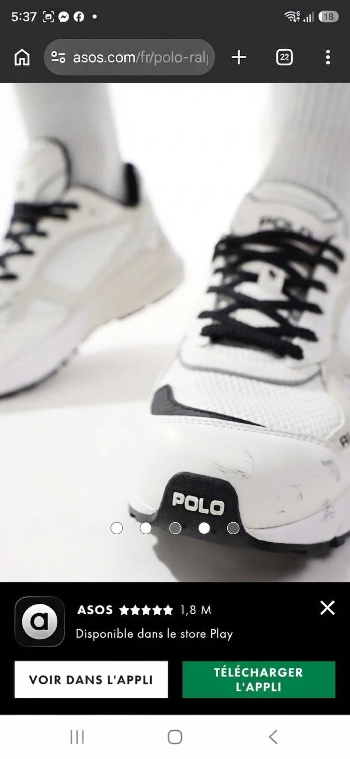 Des baskets Polo Ralph Lauren Trackster 275 blanches ornées d'accents et de lacets noirs contrastés