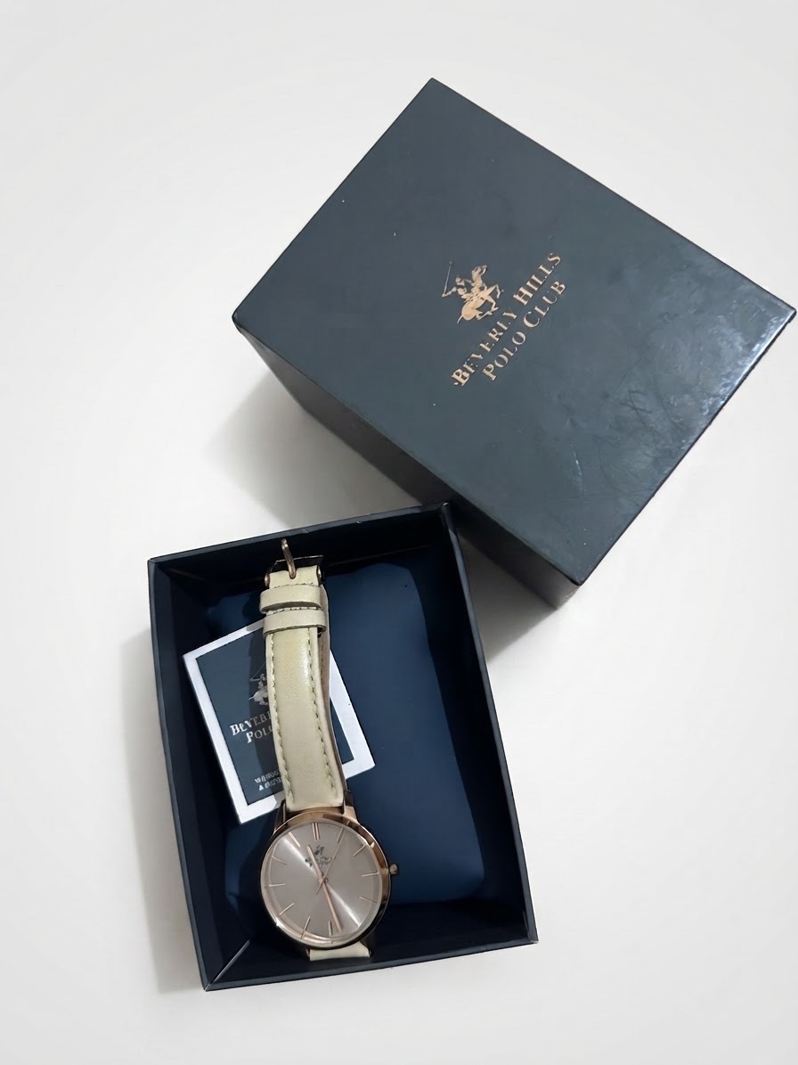 Montre femme authentique Beverly Hills Polo Club en état satisfaisant avec cadran doré