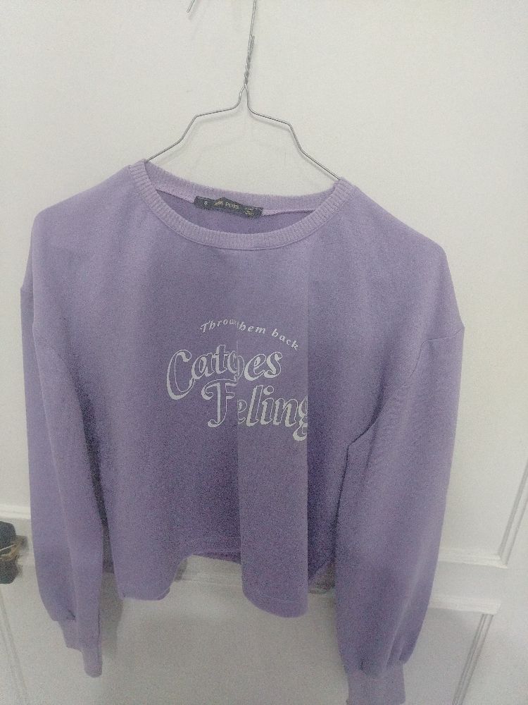 Pull coton violet, niveau ventre, made in turkey, taille s très bon état 