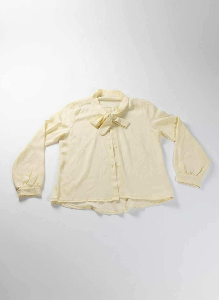 Chemise jaune pastel 