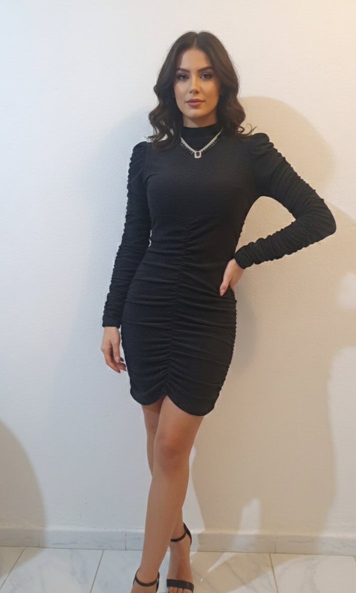 Très jolie robe soirée noir pailletée 