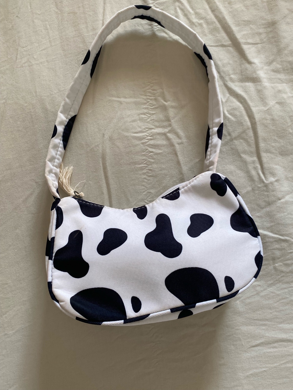 Sac à main blanc et noir imprimé vache 🐄