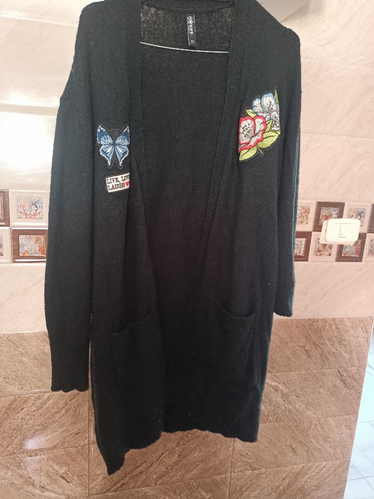 Lot de deux gilets en noir très bon état 