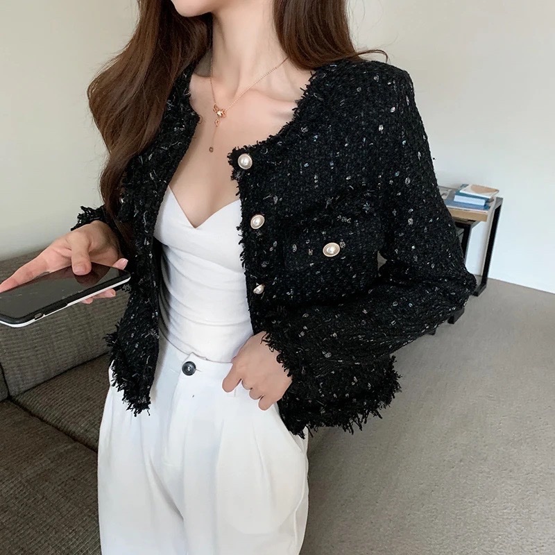 Blazer en tweed a pailettes 