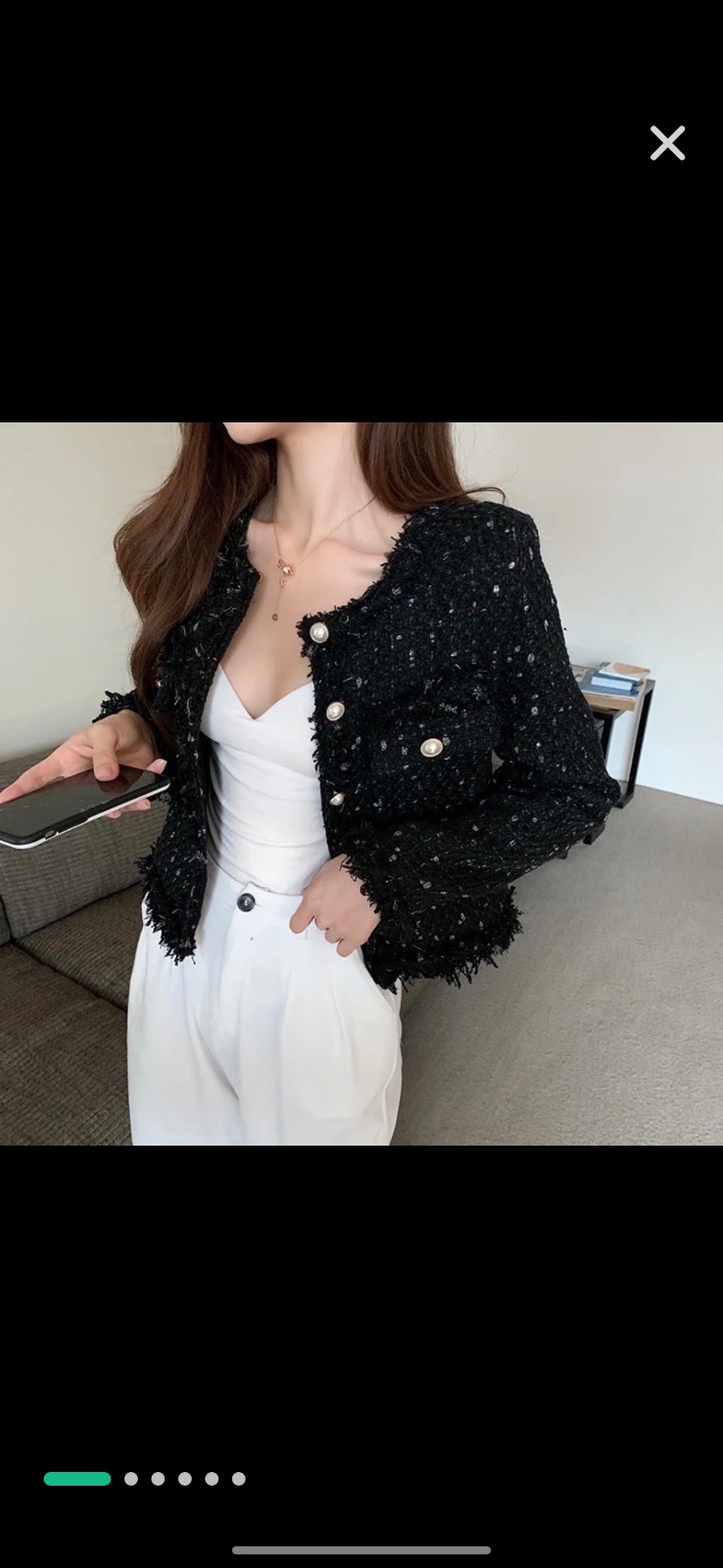 Blazer en tweed a pailettes 