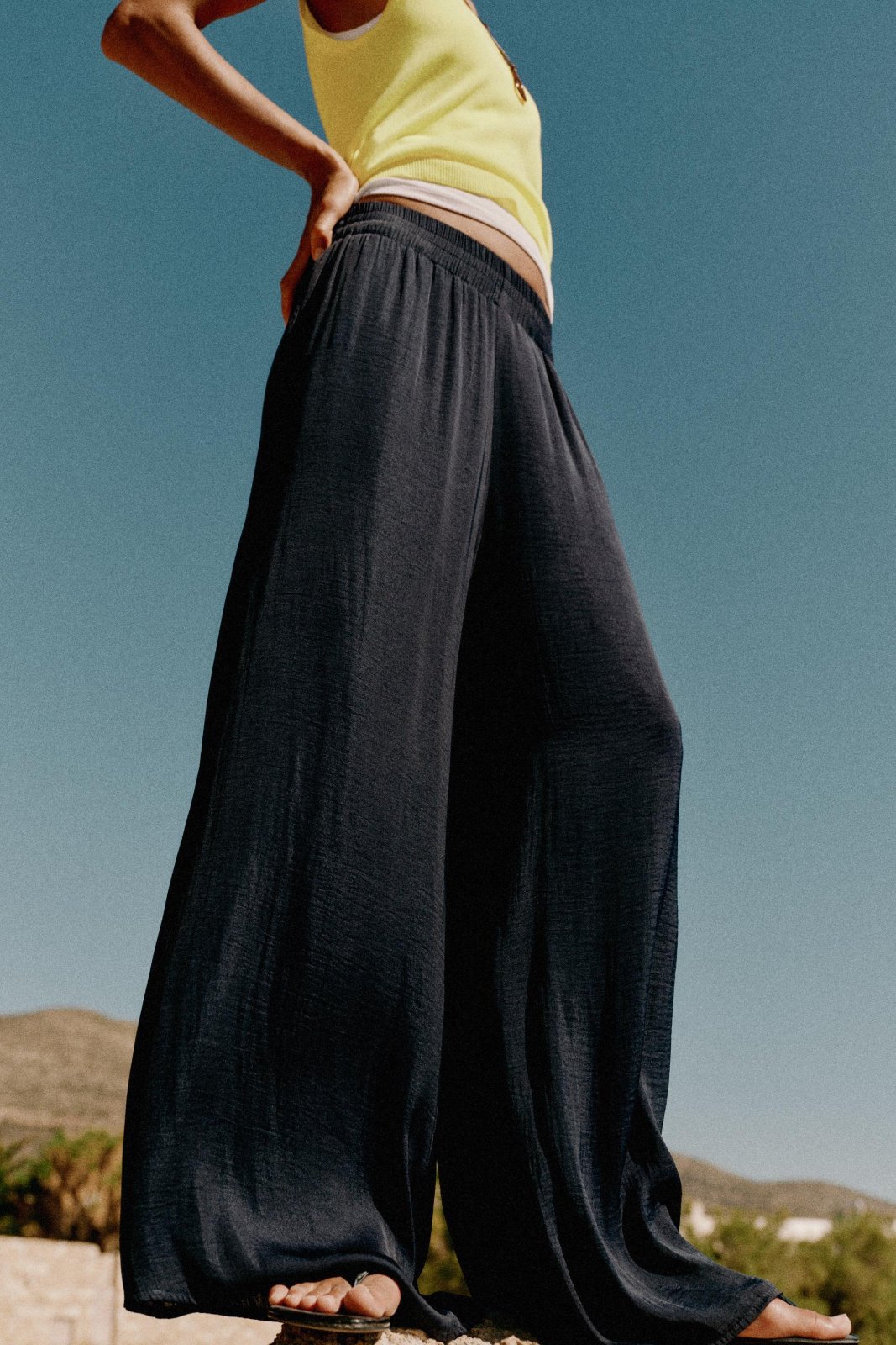 Zara flowy black wide-leg trousers, featuring a