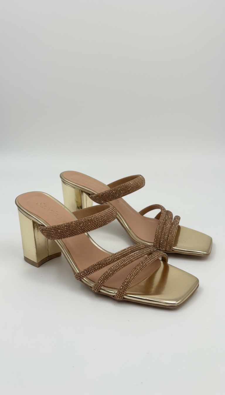 Mules dorées à talon