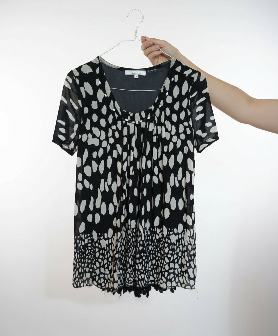 Tunique femme noire a motifs blancs