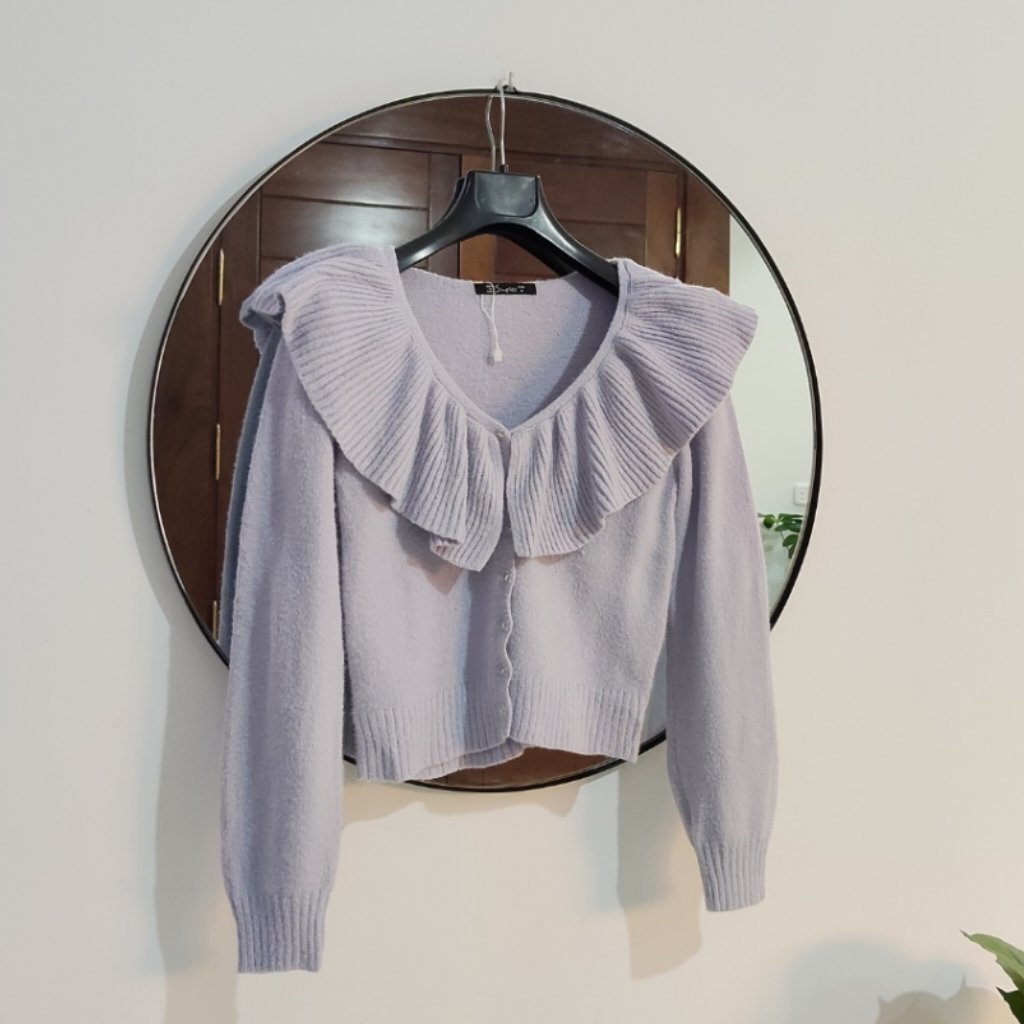 Cardigan lila à volants jamais portée 