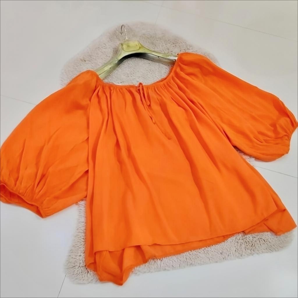 Chemise orange marches bouffantes 