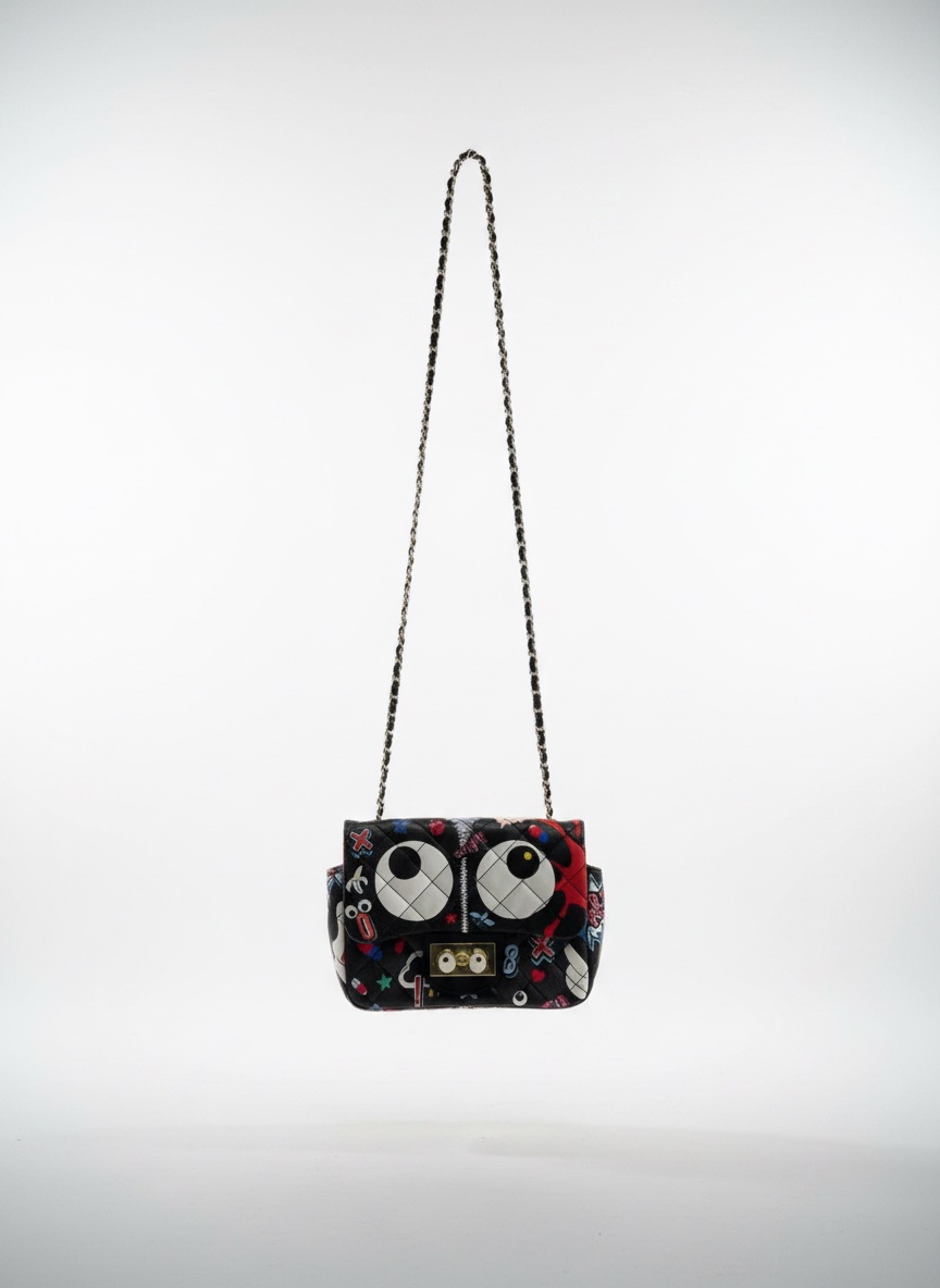 Sac à main noir à motifs