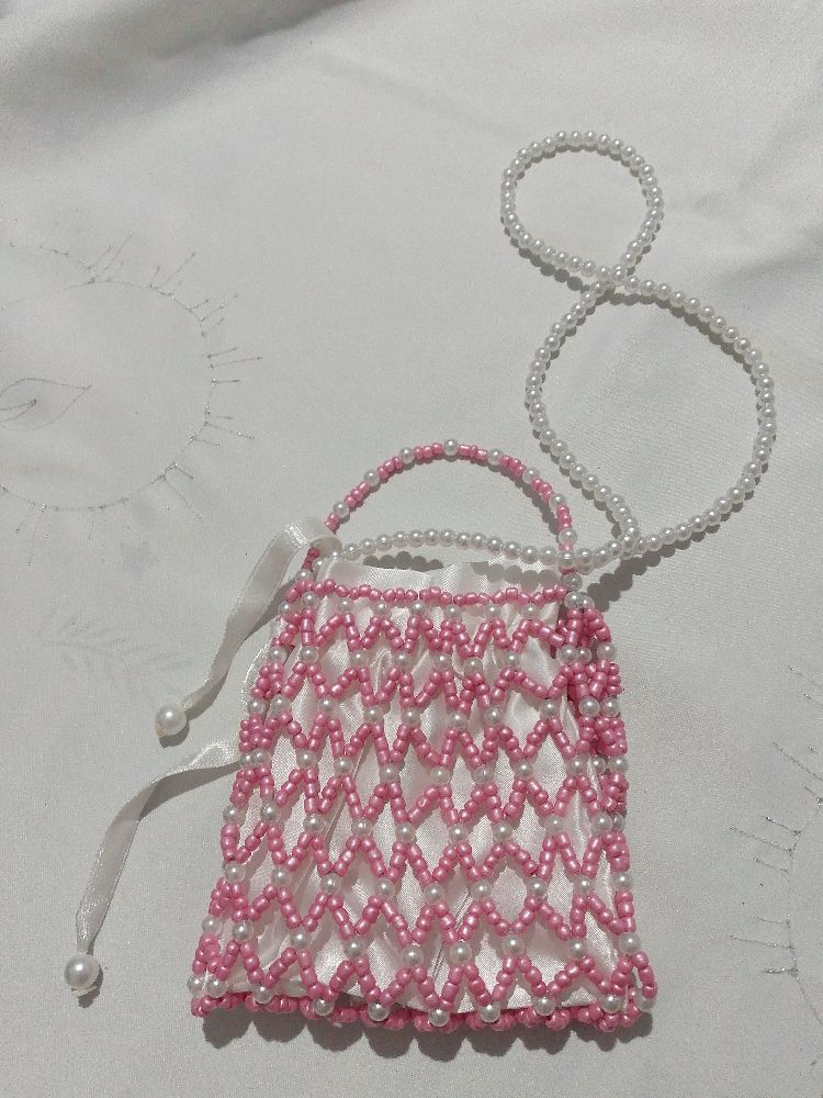 Perle rose et blanc