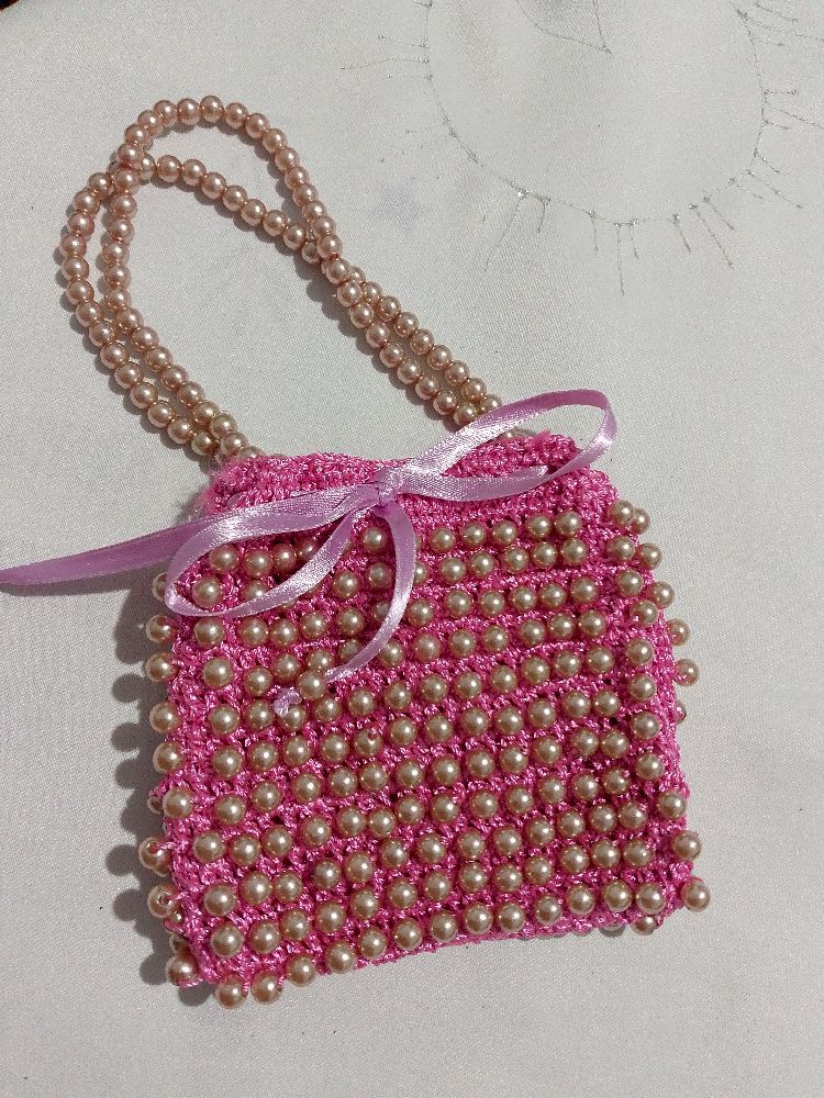 Sac perle rose champagne 