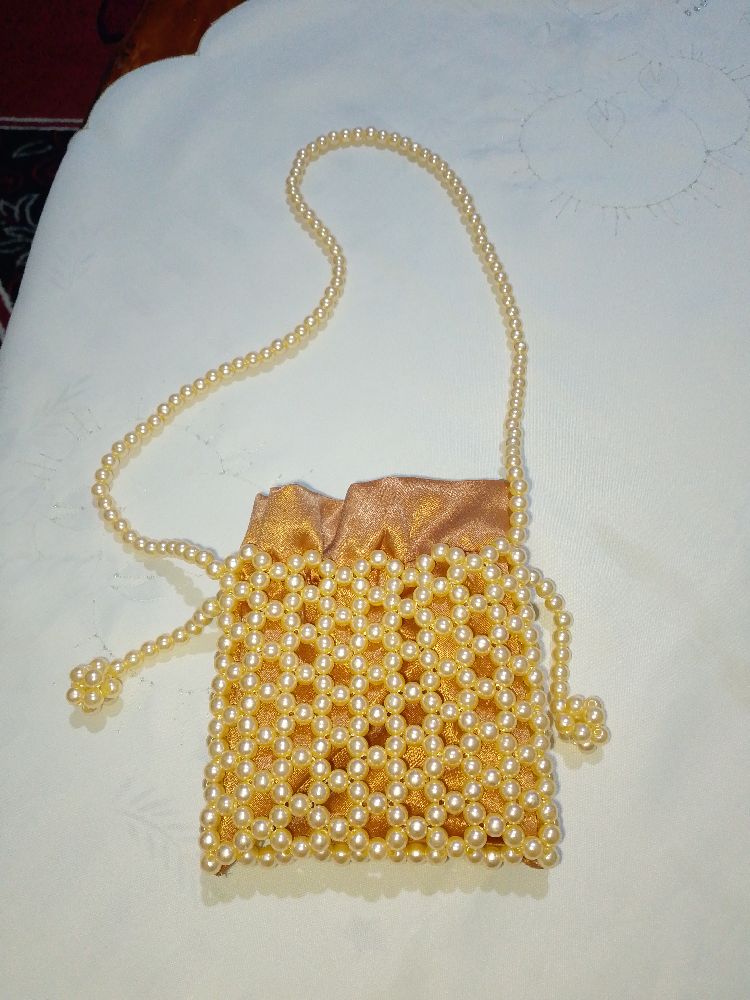 Sac perle en champagne 